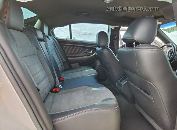 1FAHP2KT2KG107097 2019 FORD TAURUS White Vista de los asientos traseros