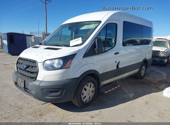 1FDZK1C85LKA79243 2020 FORD PASSENGER Белый Передняя левая четверть