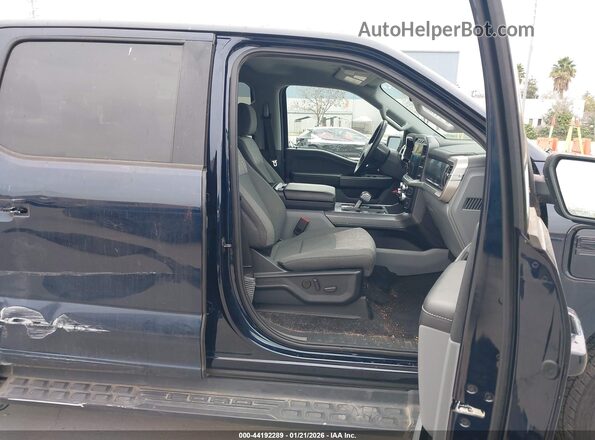 1FT6W1EV0PWG29462 2023 FORD F-150 LIGHTNING Dark Blue Вид салона спереди