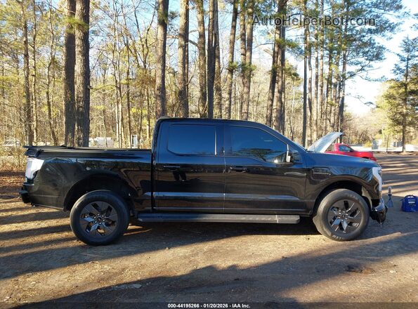 1FT6W1EV8PWG33372 2023 FORD F-150 LIGHTNING Черный Вид задней части салона