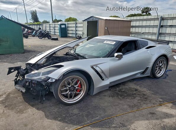 1G1YN2D60G5601882 2016 CHEVROLET CORVETTE Серебряный Передняя левая четверть