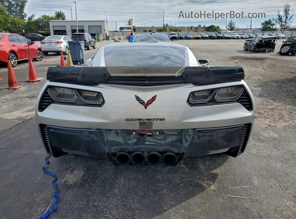 1G1YN2D60G5601882 2016 CHEVROLET CORVETTE Серебряный Вид сзади