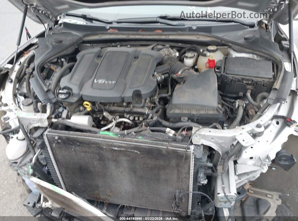 1G4ZR5SS9JU129093 2018 BUICK LACROSSE Серебряный Вид сзади