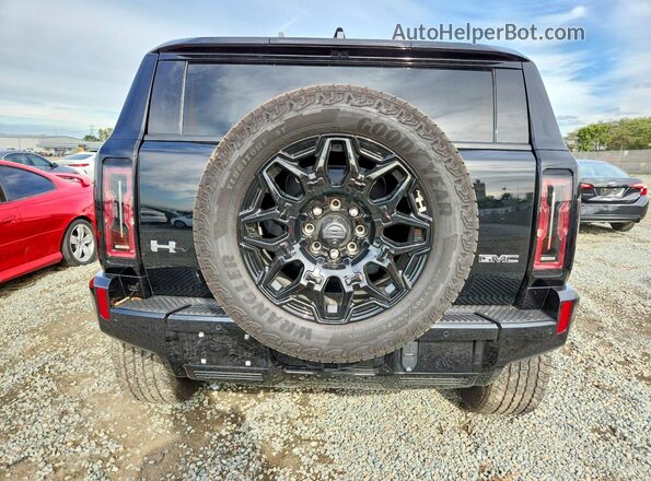 1GKB0NDEXSU106077 2025 GMC HUMMER Black Widok z tyłu