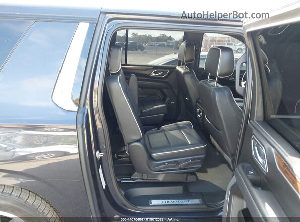 1GNSCFKD9PR166999 2023 CHEVROLET SUBURBAN Black Widok naklejki z numerem VIN