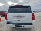 2019 Chevrolet Suburban C1500 Белый vin: 1GNSCKEC0KR172551