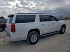 2019 Chevrolet Suburban C1500 Белый vin: 1GNSCKEC0KR172551