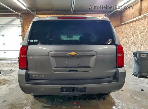 1GNSKBKC3JR377223 2018 CHEVROLET TAHOE Серый Вид сзади