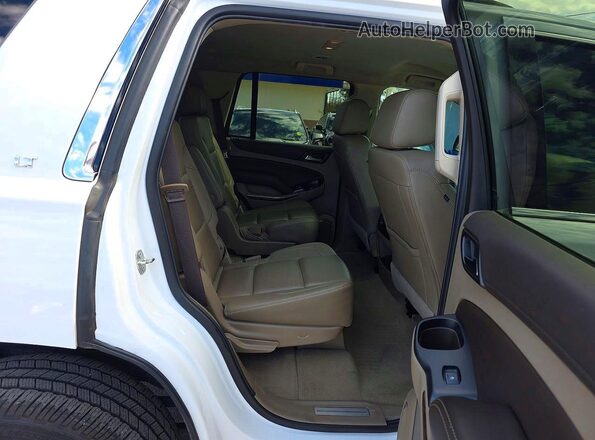 1GNSKBKC7KR339060 2019 CHEVROLET TAHOE Белый Вид салона спереди