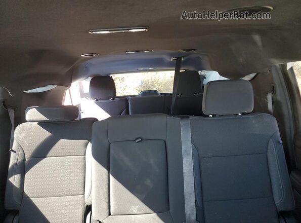 1GNSKBKD5RR165203 2024 CHEVROLET SUBURBAN White Rear seats view