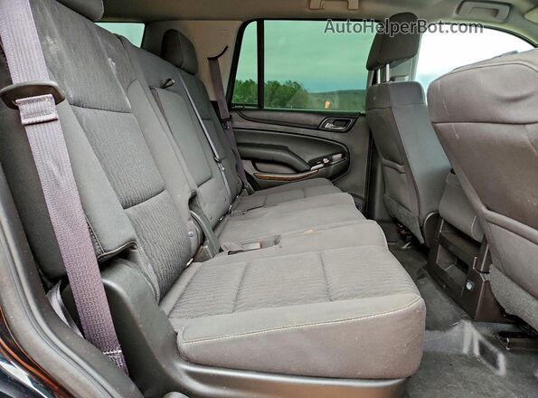 1GNSKDEC6GR325858 2016 CHEVROLET TAHOE Черный Вид задней части салона