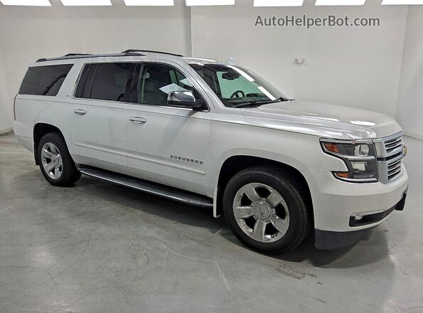 1GNSKJKC9GR274875 2016 CHEVROLET SUBURBAN Белый Передняя правая четверть