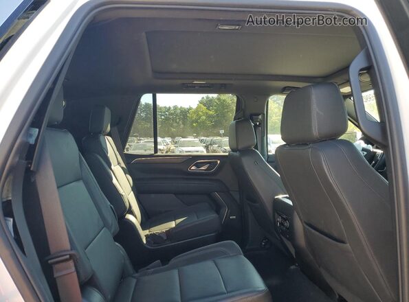 1GNSKNKD0PR427580 2023 CHEVROLET TAHOE Белый Вид задней части салона