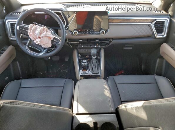 1GTP2FEK6S1234081 2025 GMC CANYON Красный Вид панели приборов