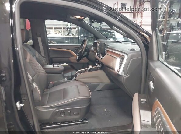 1GTP6FEK5R1114593 2024 GMC CANYON Черный Вид салона спереди