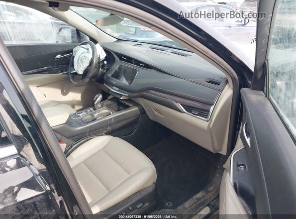 1GYFZBR48MF010872 2021 CADILLAC XT4 Черный Вид салона спереди