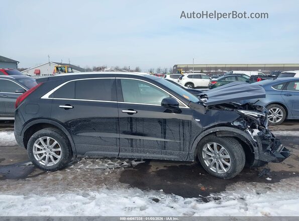 1GYFZBR48MF010872 2021 CADILLAC XT4 Черный Вид задней части салона