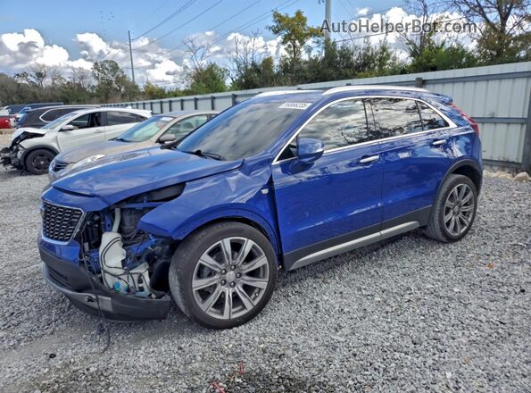 1GYFZCR4XNF151109 2022 CADILLAC XT4 Синий Передняя левая четверть