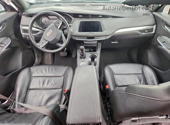 1GYFZDR42PF200490 2023 CADILLAC XT4 Серебряный Вид панели приборов