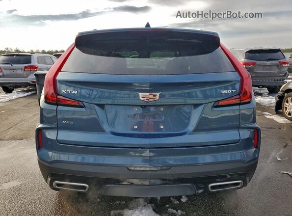 1GYFZDR46RF246620 2024 CADILLAC XT4 Синий Вид сзади
