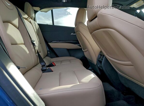 1GYFZDR46RF246620 2024 CADILLAC XT4 Синий Вид задней части салона