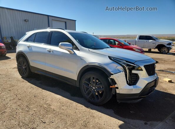 1GYFZER48NF130559 2022 CADILLAC XT4 Серебряный Передняя правая четверть
