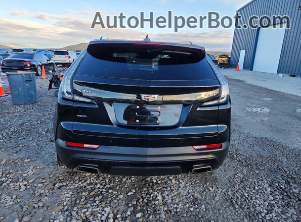 1GYFZFR47MF009347 2021 CADILLAC XT4 Черный Вид сзади