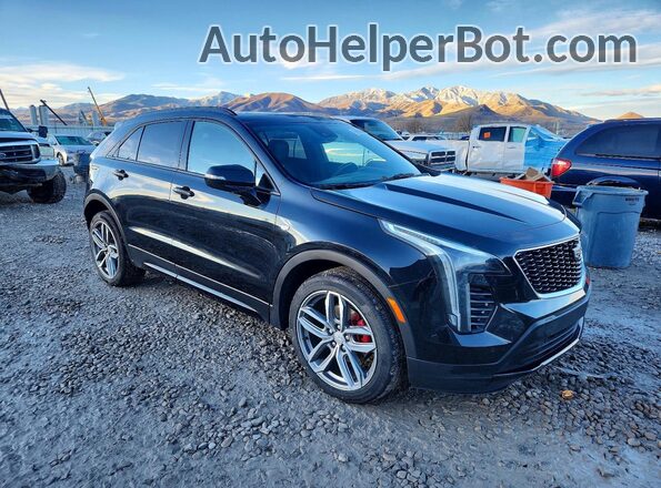 1GYFZFR47MF009347 2021 CADILLAC XT4 Черный Передняя правая четверть