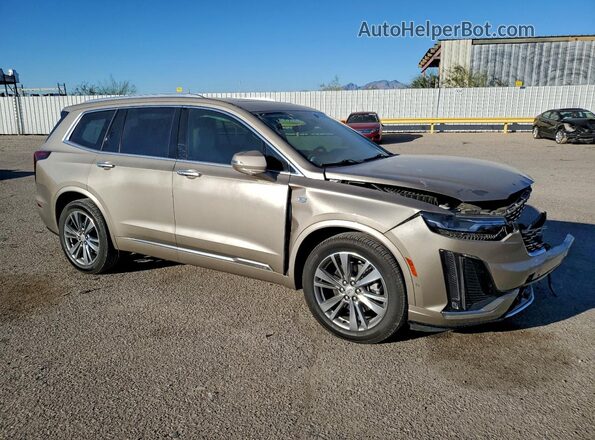 1GYKPCRS3NZ140177 2022 CADILLAC OTHER Желто-коричневый Передняя правая четверть