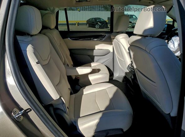 1GYKPCRS3NZ140177 2022 CADILLAC OTHER Желто-коричневый Вид задней части салона