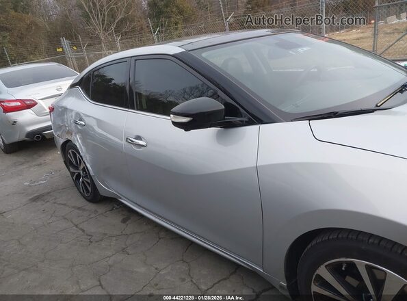 1N4AA6AP7JC403835 2018 NISSAN MAXIMA Серебряный Вид задней части салона