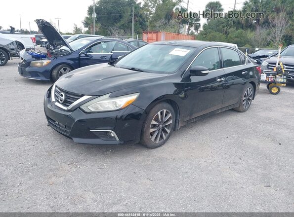 1N4AL3AP5GC159524 2016 NISSAN ALTIMA Черный Передняя левая четверть
