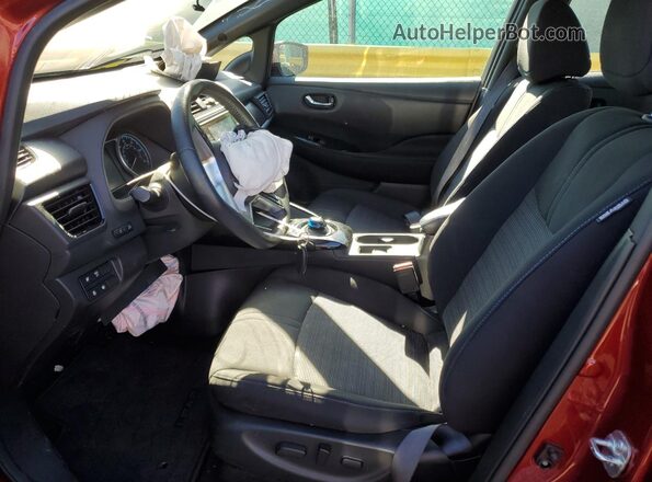 1N4CZ1CV7SC558774 2025 NISSAN LEAF Maroon Вид салону спереду