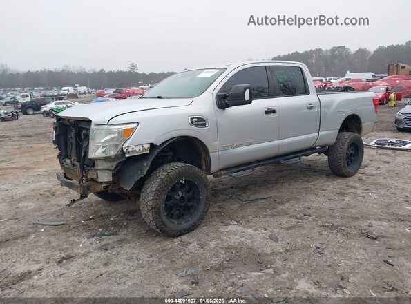1N6BA1F3XHN519016 2017 NISSAN TITAN XD Серебряный Передняя левая четверть