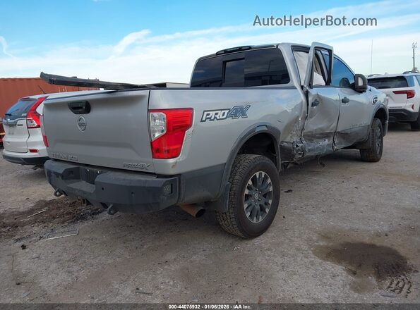 1N6BA1F40KN511684 2019 NISSAN TITAN XD Серебряный Задняя правая четверть