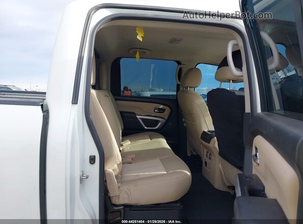 1N6BA1F41HN564628 2017 NISSAN TITAN XD White Widok naklejki z numerem VIN