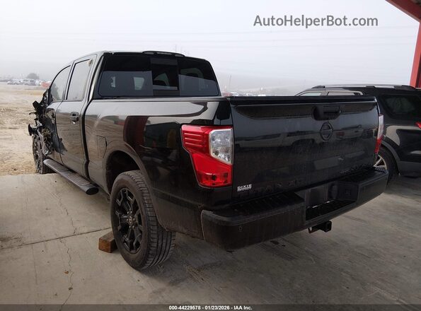 1N6BA1F49KN516592 2019 NISSAN TITAN XD Черный Задняя левая четверть