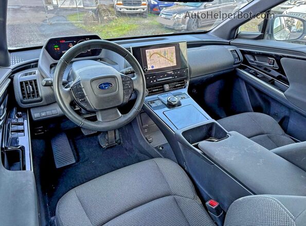 JTMABABA8PA028708 2023 SUBARU SOLTERRA White Vista de los asientos traseros