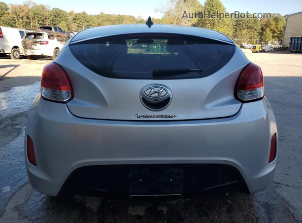 KMHTC6AD6HU315619 2017 HYUNDAI VELOSTER Серебряный Вид салона спереди