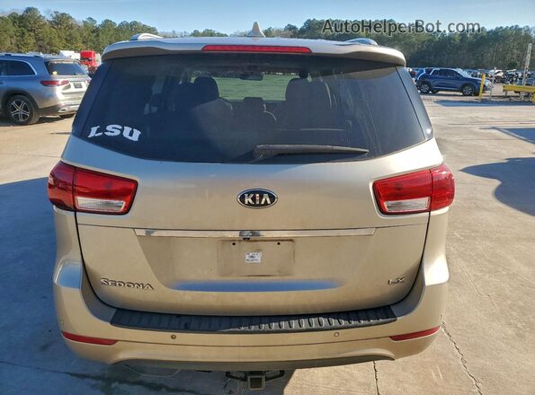 KNDMB5C10G6191522 2016 KIA SEDONA Желто-коричневый Вид салона спереди