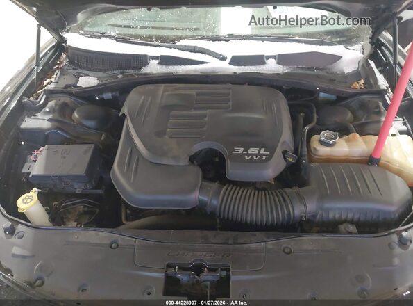 2C3CDXHG7GH350022 2016 DODGE CHARGER Черный Вид сзади
