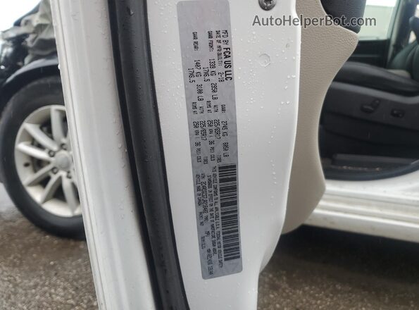2C4RDGCG7JR216402 2018 DODGE GRAND White VIN sticker view