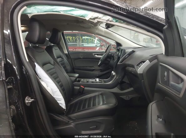 2FMPK4J90RBA28577 2024 FORD EDGE Черный Вид салона спереди