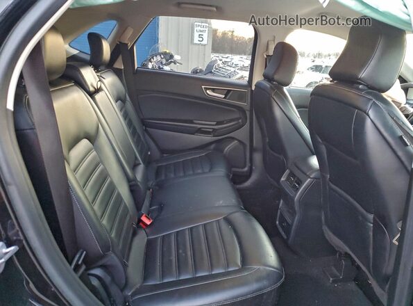 2FMPK4J98PBA27108 2023 FORD EDGE Black Սալոնի հետևի տեսք
