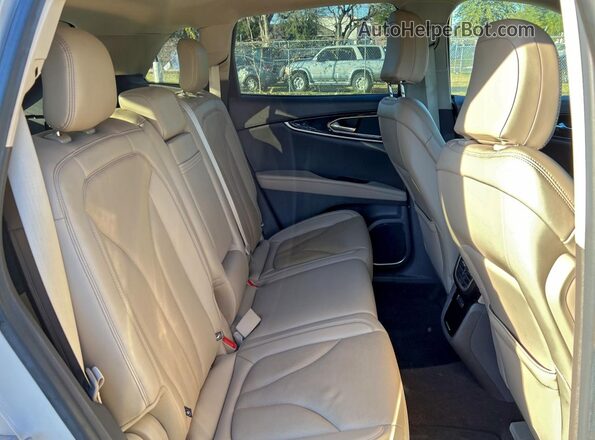 2LMPJ6K91PBL11844 2023 LINCOLN NAUTILUS Cream Widok z tyłu