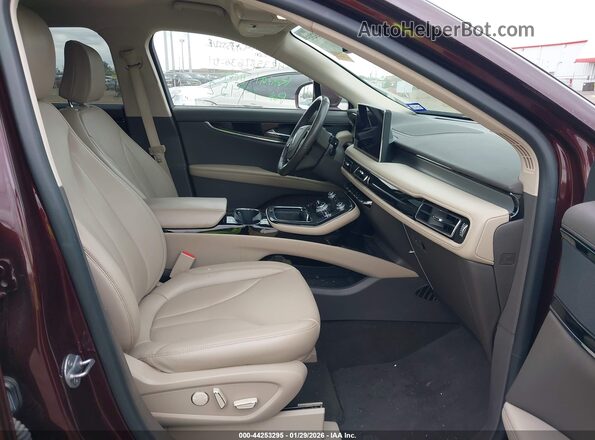 2LMPJ8J94PBL29865 2023 LINCOLN NAUTILUS Темно-бордовый Вид салона спереди