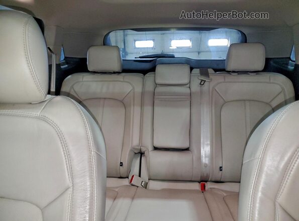 2LMTJ8LP5GBL57085 2016 LINCOLN MKX Серебряный Вид задних сидений