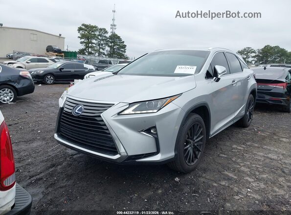 2T2BGMCA4GC001812 2016 LEXUS RX 450H Серебряный Передняя левая четверть