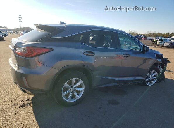 2T2BZMCA1GC001955 2016 LEXUS RX Gray Trasero derecho