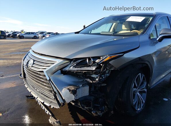 2T2ZZMCA2JC093504 2018 LEXUS RX 350 Золотой Вид спереди